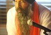 Jaswinder Singh Sandhu reads from the 1,430-page Sikh holy book, the Sri Guru Granth Sahib. Sandhu and other local Sikhs were gathered to celebrate the birthday of the religion’s founder, Guru Nanak Dev Ji. 