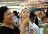 A child samples U.S.-grown rice during a marketing study in September at a store in Guangzhou, China. The U.S. rice industry has spent more than six years trying to win permission to export their crops to the world’s largest rice producer. 