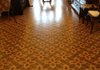 A hand-painted reproduction of a historic floor cloth, which Riley May of Columbia, Tenn., spent months crafting, now graces the central hallway of the Little Rock Visitor Information Center in historic Curran Hall. 