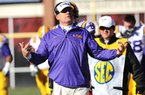 NWA Media/ANDY SHUPE
Louisiana State coach Les Miles gestures to his coaches Friday, Nov. 23, 2012, during the second quarter of play against Arkansas at Razorback Stadium.