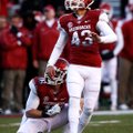Arkansas sophomore John Henson kicks his first college field goal. Henson replaced Zach Hocker after...