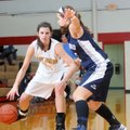 Justyne Huber, left, Prairie Grove, works the ball Saturday near Greenwood’s Megan Hartness. 