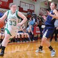Mackenzie Brown, left, Greenland, drives around Shiloh Christian’s Alexis Jones on Saturday in the F...