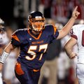 Rogers Heritage defensive lineman Carson Scott celebrates after the defense created a turnover on do...