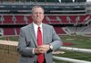 Jeff Long's football hire will have a major financial impact on the university's overall athletic program. 
