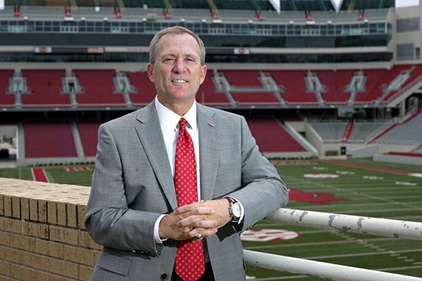 Jeff Long's football hire will have a major financial impact on the university's overall athletic program. 