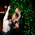 Cinthia Vlaovich takes a photo Saturday of her husband, Dean Vlaovich, and their son, Nicholas Vlaov...