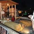 Elizabeth Ramiez, 5, dressed as an angel, stands Saturday on the parade float for Seventh-day Advent...