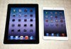 The iPad Mini (right) provides the abilities of a standard iPad, but in a smaller and thinner package. 
