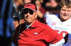 John L. Smith’s contract, which runs through February, includes a “right of reassignment” clause that Arkansas Athletic Director Jeff Long enacted Saturday. 