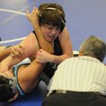 Bentonville’s Aaron Grigsby controls Springdale Har-Ber’s David Salgado during the NWA Duels at Heri...