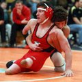 Joey Adams (right), then with Springdale Har-Ber, wrestles Russellville’s Jesse Johnson for the cham...