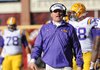 NWA Media/ANDY SHUPE -- LSU coach Les Miles speaks Friday, Nov. 23, 2012, on the sidelines during the second quarter against Arkansas at Razorback Stadium.