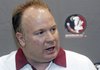 In this Aug. 12, 2012, file photo, Florida State defensive coordinator Mark Stoops is interviewed during the Seminoles' football media day in Tallahassee, Fla. Kentucky has hired Florida State defensive coordinator Mark Stoops as its new football coach. The university announced Tuesday, Nov. 27, 2012 that Stoops will replace Joker Phillips, who was fired on Nov. 4. (AP Photo/Phil Sears, File)