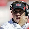Arkansas State head coach Gus Malzahn watches the first half of their NCAA college football game aga...
