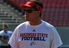 Arkansas State head coach Gus Malzahn looks on during a preseason practice in Jonesboro. 