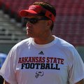 Arkansas State head coach Gus Malzahn looks on during a preseason practice in Jonesboro. 
