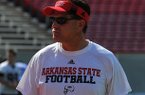 Arkansas State head coach Gus Malzahn looks on during a preseason practice in Jonesboro. 