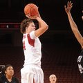 Arkansas senior post Sarah Watkins, center, takes a shot in the lane as Texas Southern junior center...