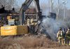 Fayetteville emergency responders evaluate the situation after a train car caught fire Thursday afternoon near Cato Springs Road.