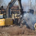 Fayetteville emergency responders evaluate the situation after a train car caught fire Thursday afte...