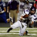 Jase Rapert, a Fayetteville junior, makes a reception against Rogers High during on Oct. 12 at Mount...