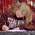 Amanda Dickerson of Rogers signed a letter of intent to compete in gymnastics for Texas Women’s Univ...