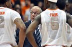 Syracuse head coach Jim Boeheim, center, talks with his players during a timeout against Princeton in the second half of an NCAA college basketball game in Syracuse, N.Y., Wednesday, Nov. 21, 2012. Syracuse won 73-53. (AP Photo/Kevin Rivoli)