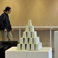 A University of Arkansas student checks out Kelly Brenner Justice’s Solo Show exhibition at the Anne...