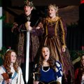 Choir members (left) sing on stage Thursday during the feast. 
