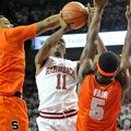 NWA Media/MICHAEL WOODS --11/30/2012-- Arkansas guard BJ Young is fouled by Syracuse defender DaJuan...