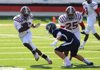 Pine Bluff’s Walter Ashley (left) tries to avoid Greenwood’s Drew Morgan as Demetrius Anderson (25) attempts to make a block during Saturday’s Class 6A championship game at War Memorial Stadium in Little Rock. Greenwood won 51-44 to earn its third consecutive state title, its first in Class 6A. 