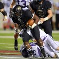 Tearris Wallace, Bentonville, drives against Fayetteville’s defense in the first half during their 7...