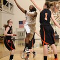 Jamayne Potts, center, Bentonville, takes the ball to the basket Saturday under pressure from Gravet...