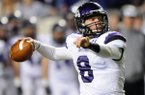 Austin Allen, Fayetteville quarterback, looks downfield for an open receiver Saturday in the third quarter of the game against Bentonville at War Memorial Stadium in Little Rock for the Class 7A football state championship.