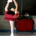Pooja Kalyan, 10, (above) performs Saturday during the annual figure skating show presented by the A...
