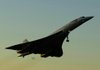 A British Airways Concorde takes off at sunrise from John F. Kennedy International Airport in New York for its last flight in 2003. 
