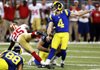 St. Louis Rams place-kicker Greg Zuerlein (right) watches his 54-yard field goal during overtime against the San Francisco 49ers on Sunday at the Edward Jones Dome in St. Louis. The field goal gave the Rams a 16-13 victory. 