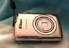 The Nikon Coolpix S01 takes “compact” cameras to a whole new size — much smaller. 