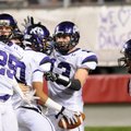 Fayetteville players celebrate after Jordan Dennis’ interception and touchdown in the third quarter ...