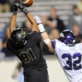 Jimmie Jackson, left, Bentonville, battles for the ball Saturday with Fayetteville’s Cole Harris at ...