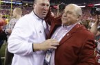 Bret Bielema (left) was named Arkansas' head coach on Tuesday. 