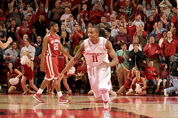 NWA Media/ANTHONY REYES -- Arkansas sophomore guard BJ Young charges upcourt after scoring the go-ahead basket against Oklahoma in the second half Tuesday, Dec. 4, 2012 at Bud Walton Arena in Fayetteville. The Razorbacks won 81-78.