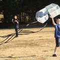 William Brand, 12, right, and his brother, Clayton Brand, 14, both of Springdale, try Monday to get ...