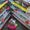 Madeline Rae Miller
(above), 4, reads “Fancy Nancy and the Too-Loose Tooth” by Jane O’Connor on Tue...