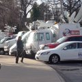Live trucks set up outside Razorback Stadium for Bret Bielema's introduction as head coach. 