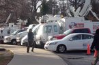 Live trucks set up outside Razorback Stadium for Bret Bielema's introduction as head coach.