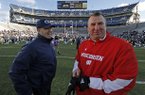 Bret Bielema (right) will make $3.2 million per year as head coach at Arkansas.