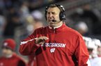 FILE - In this Nov. 24, 2012, file photo, Wisconsin head coach Bret Bielema shouts from the sidelines during an NCAA college football game against Penn State in State College, Pa. . A person familiar with the situation tells The Associated Press on Tuesday, Dec. 4, 2012, that Bielema has agreed to become the new coach at Arkansas.  (AP Photo/Gene J. Puskar, File)