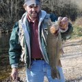 Tonkinson shows a 21-inch rainbow trout that hit a black woolly bugger Tonkinson tied himself. 
